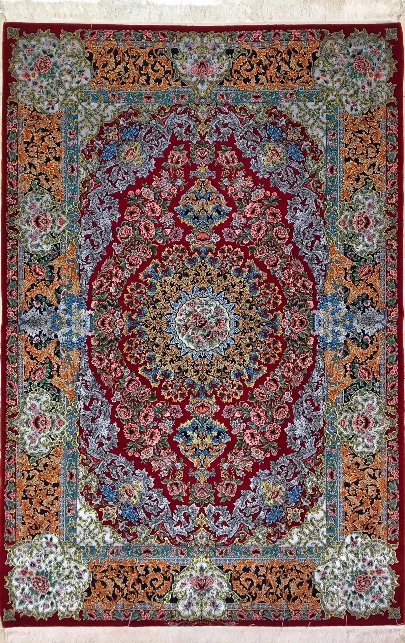 Hand-knotted Isfahan Persian carpet with intricate floral design in wool and silk